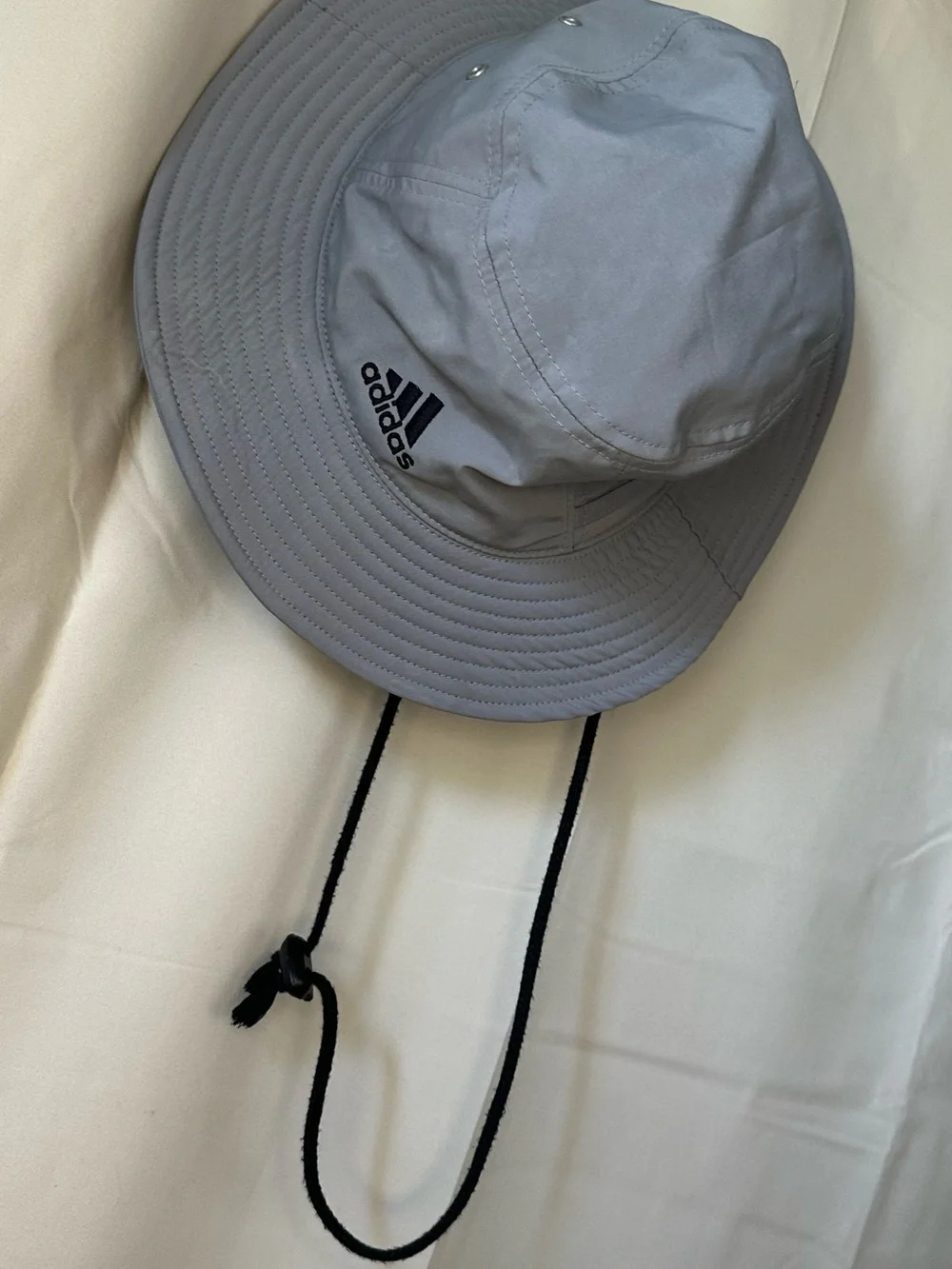 adidas Victory Bucket Hat in grey.